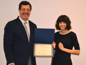 man and woman posing with award