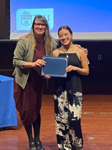 Student receiving their award at the HSS Fall 2022 Academic Achievement Awards