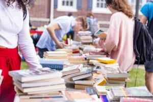 piles of books on a table