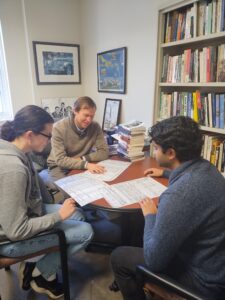 Students Sammy John and Ryan Perrone work with their professor Dr. Robert McGreevey 