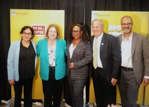 Lined up From left to right: Dean of Business Sunita Ahlawat, Senator Linda Greenstein, Assemblywoman Verlina Reynolds-Jackson, and Dean of Humanities and Social Sciences Christopher Fisher posing for the camera.