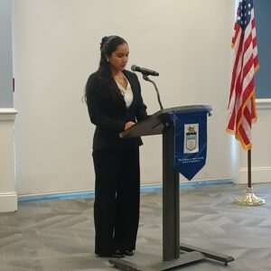 An HSS Student speaking at the podium.